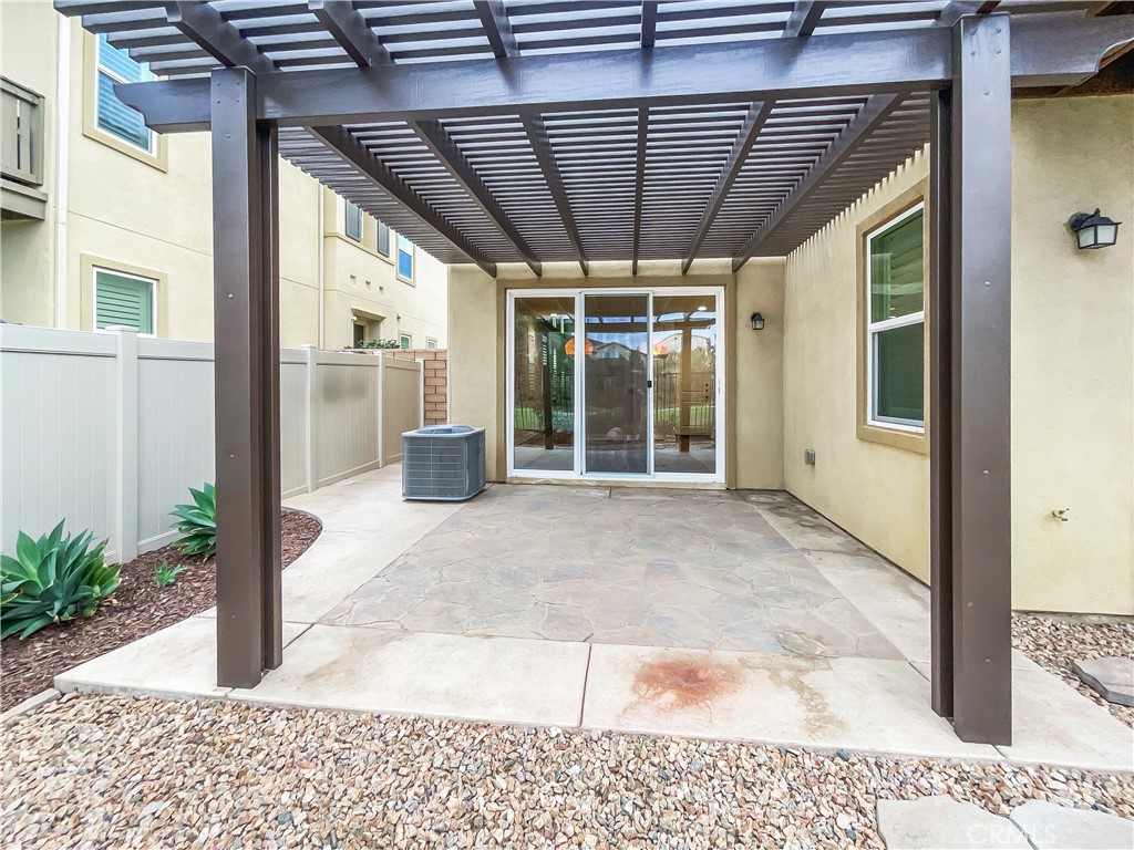 38352 Windingwalk Drive Murrieta, CA 92563 - Photo 8 of 28 a view of a porch with a table and chairs