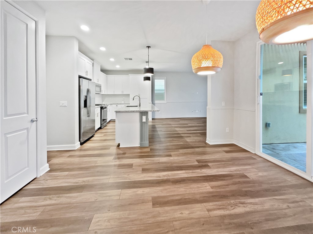 38352 Windingwalk Drive Murrieta, CA 92563 - Photo 9 of 28 a view of kitchen and hall with a window