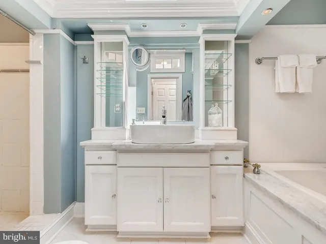 a bathroom with a sink and a bathtub