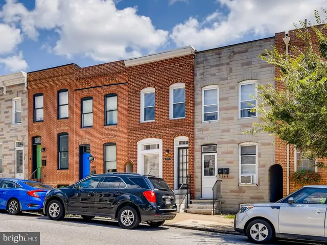 a car parked in front of a building