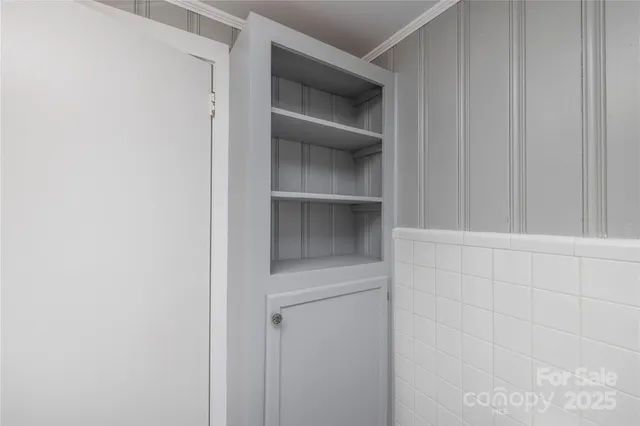 a view of an empty walk in closet