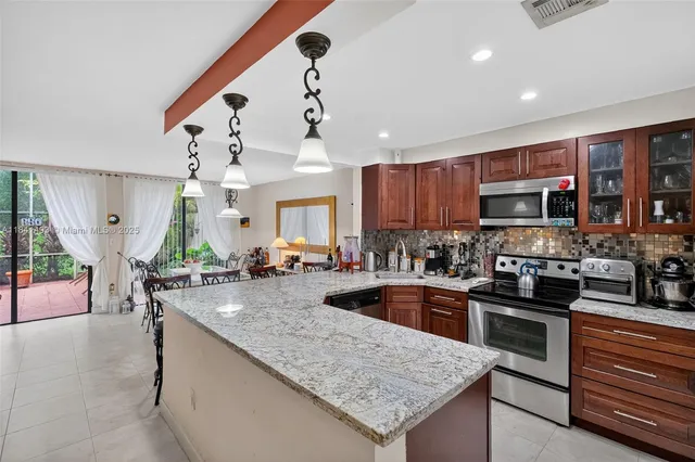 $520,000 | 3402 Torremolinos Avenue, Unit F35, Doral, FL 33178