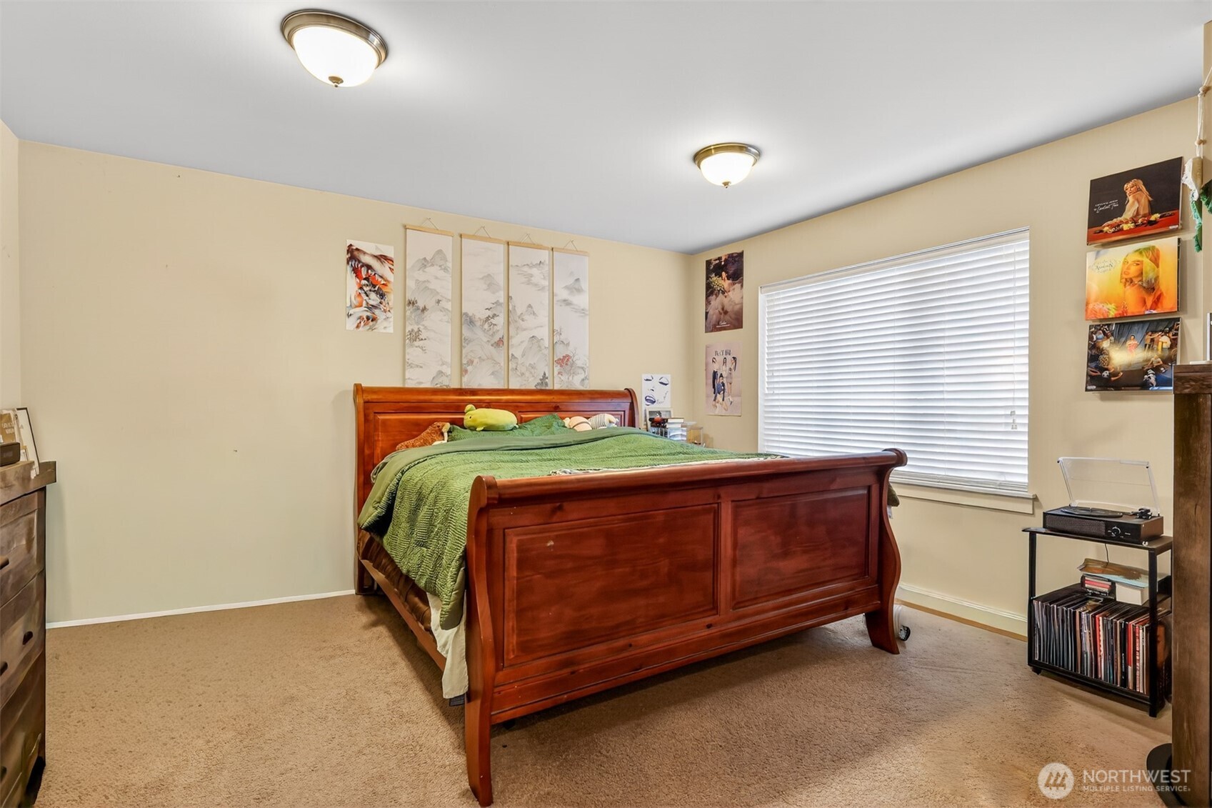 122 185th Place Southwest Bothell, WA 98012 - Photo 11 of 39 a bedroom with a bed and a window