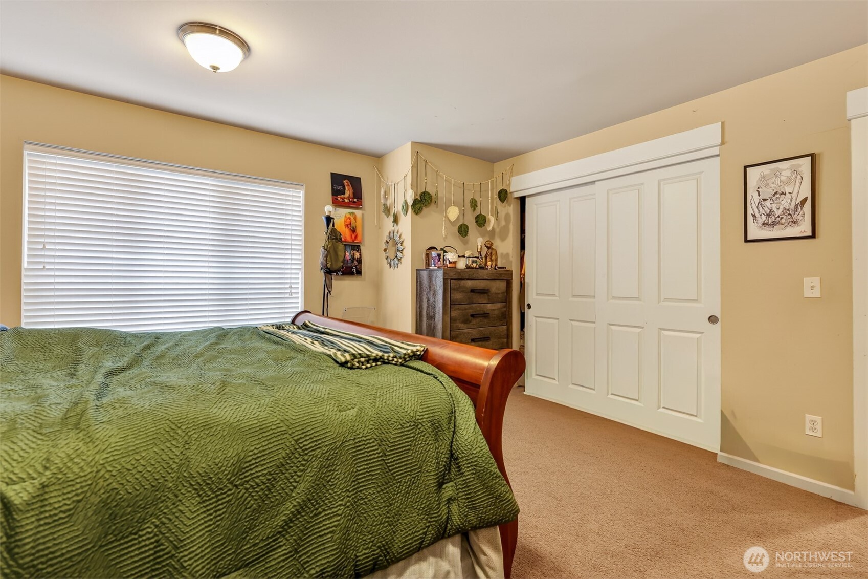 122 185th Place Southwest Bothell, WA 98012 - Photo 12 of 39 a bedroom with a bed and a window