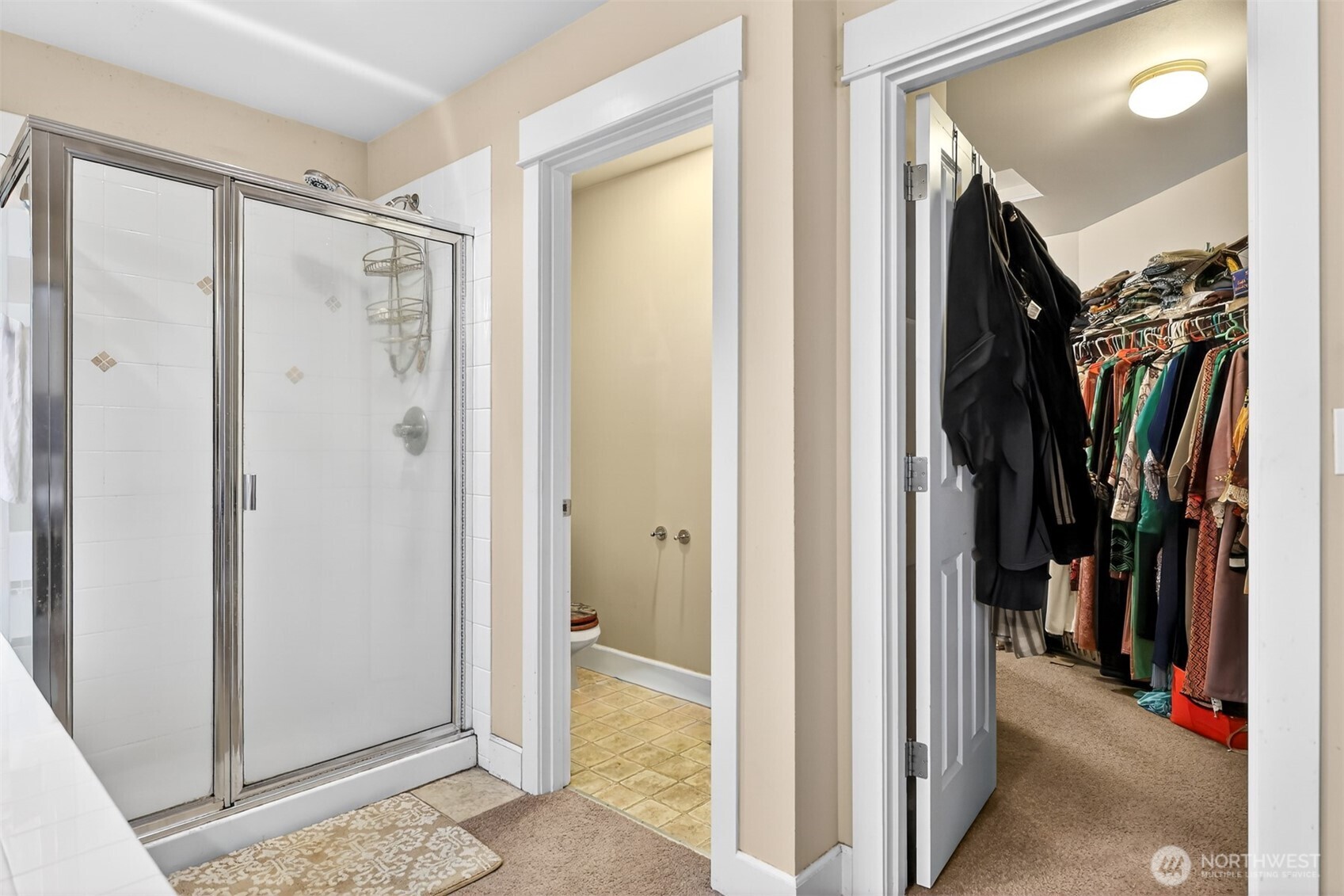 122 185th Place Southwest Bothell, WA 98012 - Photo 17 of 39 a view of walk in closet with clothes and shoes