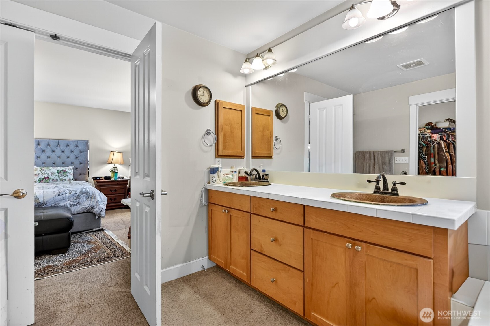 122 185th Place Southwest Bothell, WA 98012 - Photo 18 of 39 a en suite bathroom with a sink and a mirror