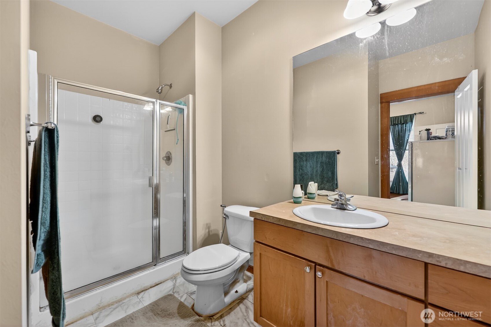 122 185th Place Southwest Bothell, WA 98012 - Photo 19 of 39 a bathroom with a sink a toilet and shower