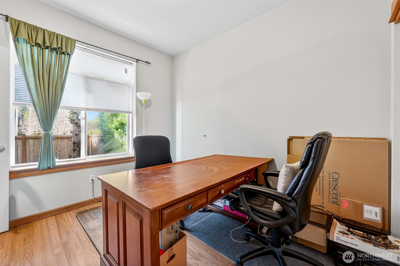 122 185th Place Southwest Bothell, WA 98012 - Photo 20 of 39 a view of a workspace with furniture and a window