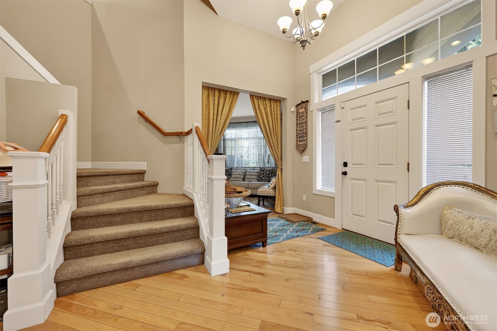 122 185th Place Southwest Bothell, WA 98012 - Photo 34 of 39 a living room with furniture and a wooden floor