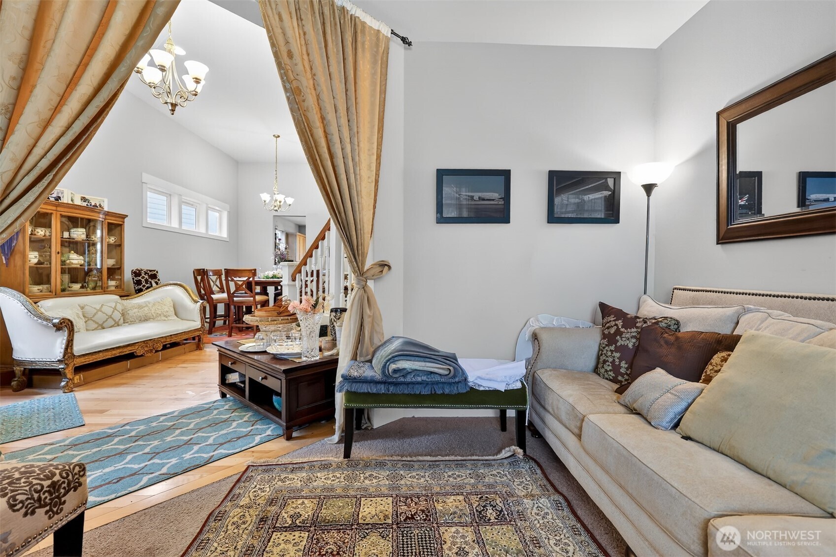 122 185th Place Southwest Bothell, WA 98012 - Photo 37 of 39 a living room with furniture and a rug