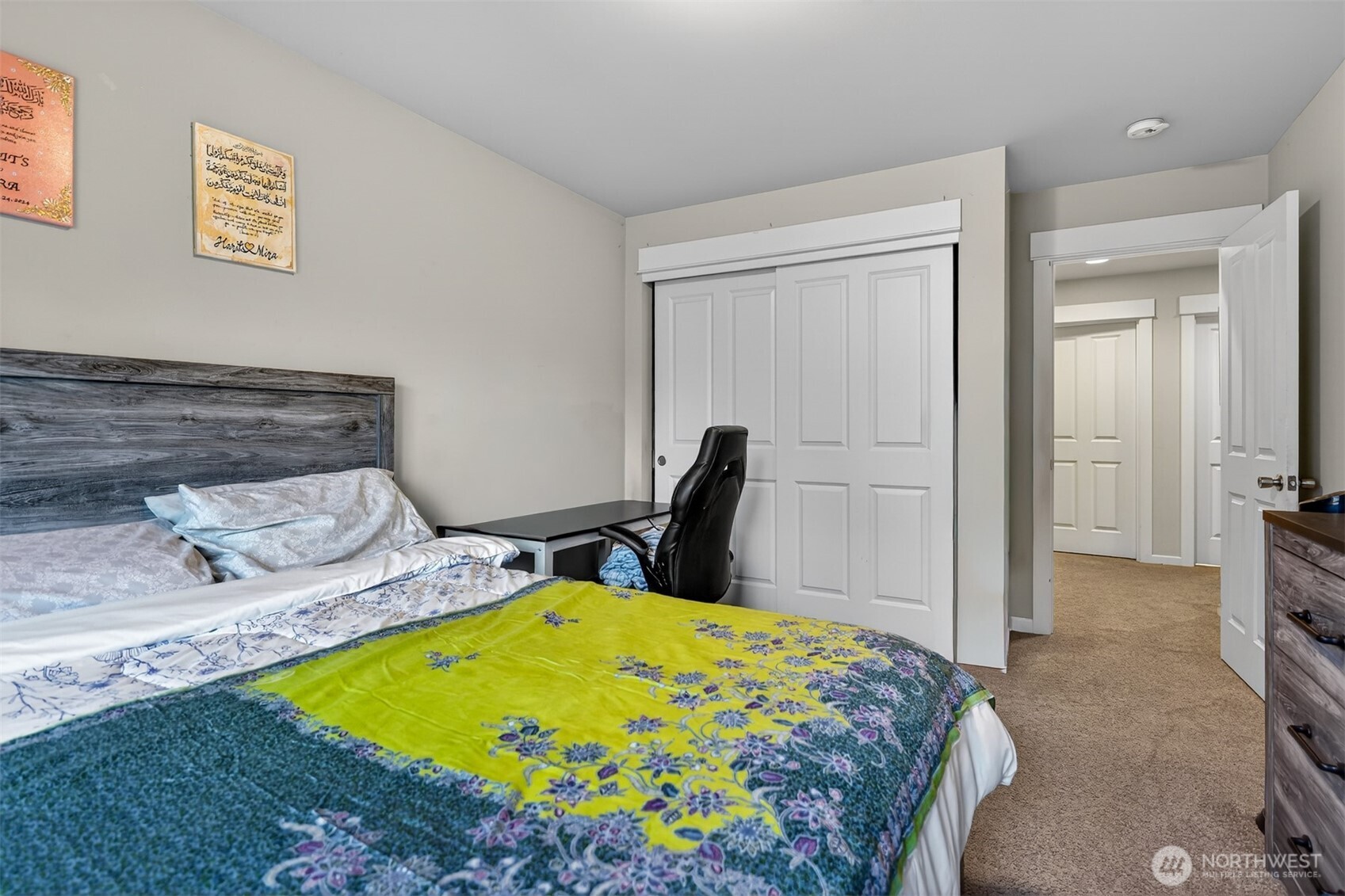 122 185th Place Southwest Bothell, WA 98012 - Photo 7 of 39 a bedroom with a bed and a dresser