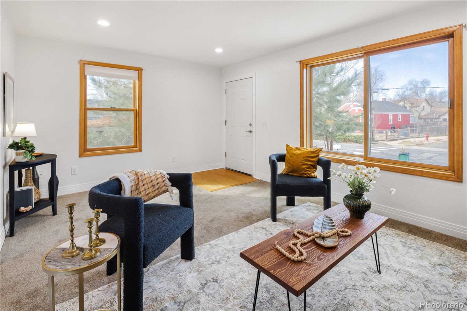 380 County Road Louisville, CO 80027 - Photo 11 of 42 a living room with furniture and a window