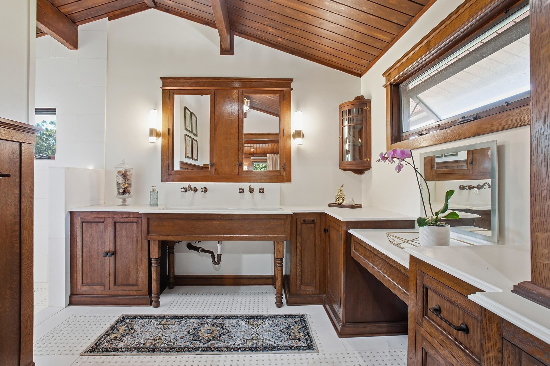 30 Mamao Place Haiku, HI 96708 - Photo 24 of 50 a spacious bathroom with a sink double vanity and a mirror