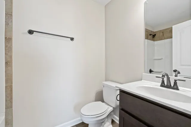 a view of a backyard of the house