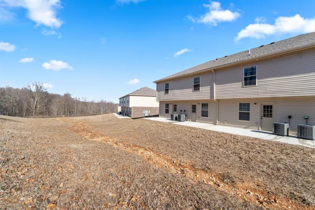 a view of a backyard space