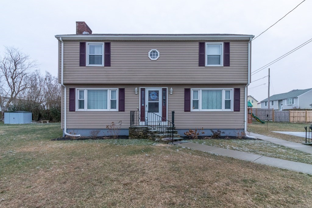 45 Baird Street Fall River, MA 02721 - Photo 1 of 42 a front view of a house with a yard