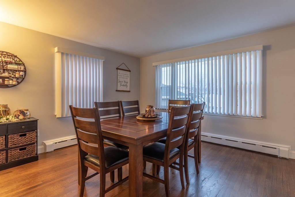 45 Baird Street Fall River, MA 02721 - Photo 18 of 42 a view of a dining room with furniture and wooden floor