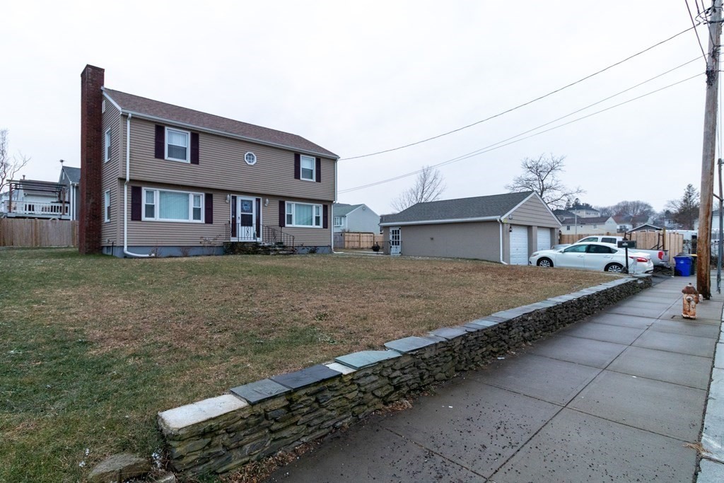 45 Baird Street Fall River, MA 02721 - Photo 2 of 42 a front view of a house with a yard