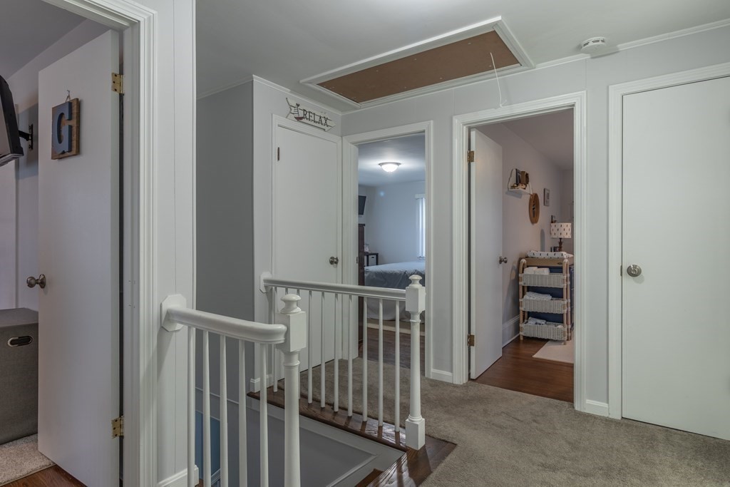 45 Baird Street Fall River, MA 02721 - Photo 21 of 42 a view of a hallway with bedroom and stairs
