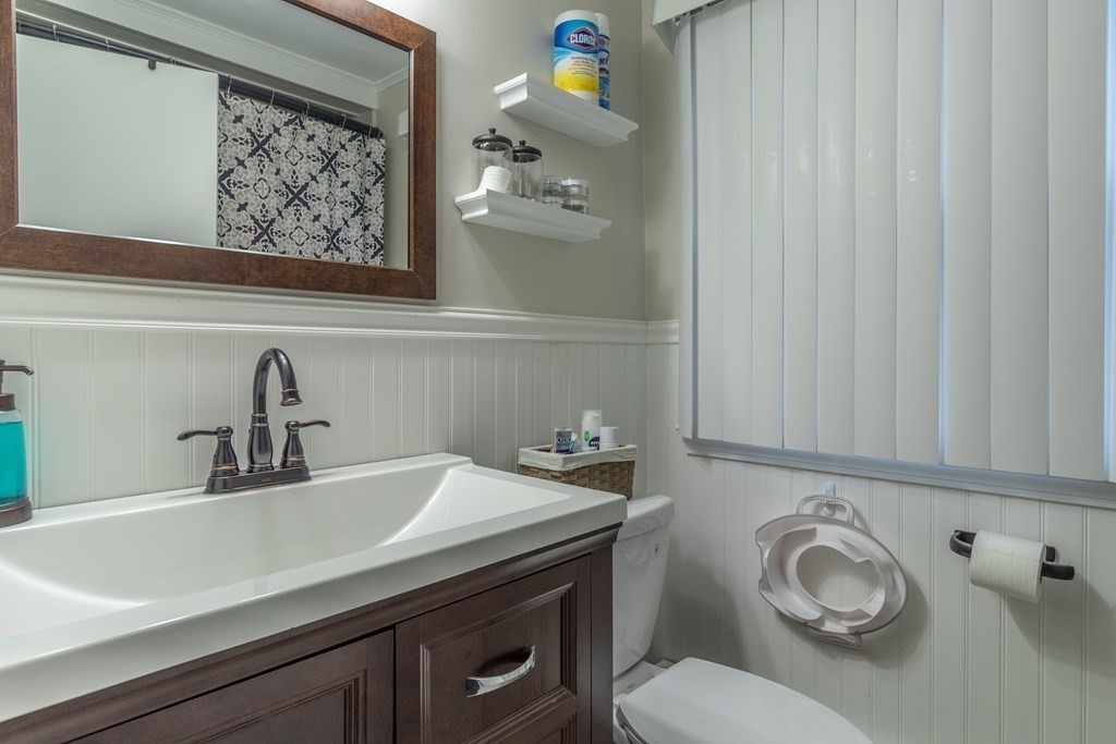 45 Baird Street Fall River, MA 02721 - Photo 22 of 42 a bathroom with a sink vanity and toilet