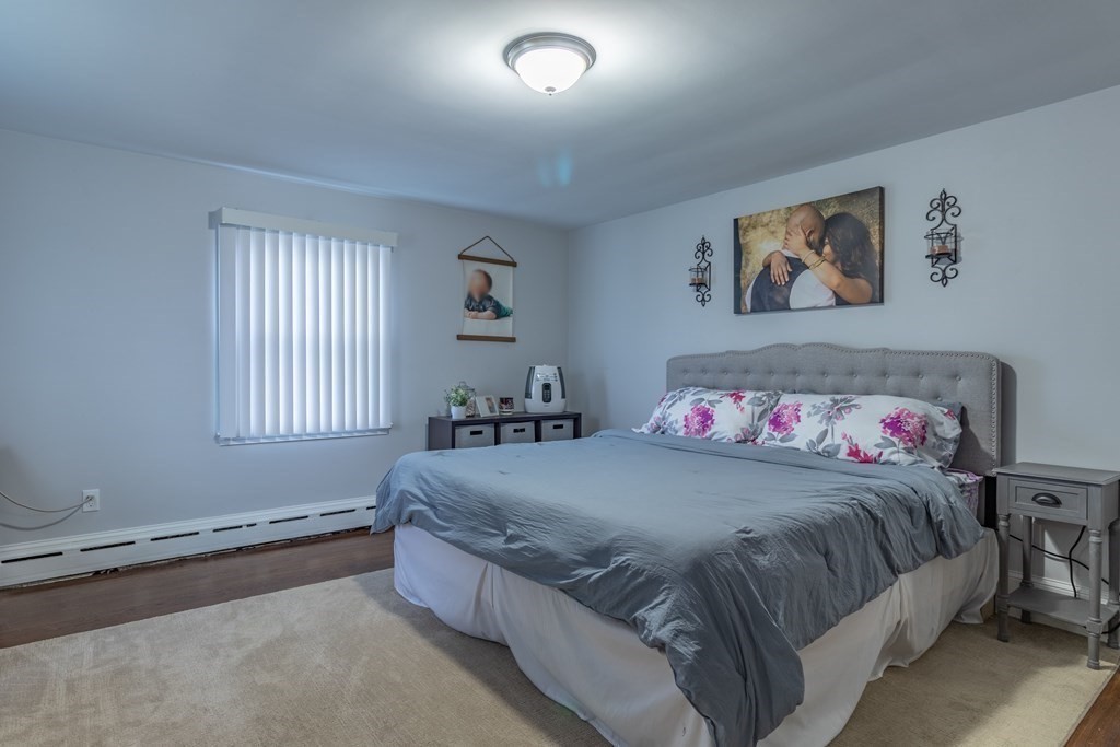 45 Baird Street Fall River, MA 02721 - Photo 24 of 42 a bedroom with a bed and a window