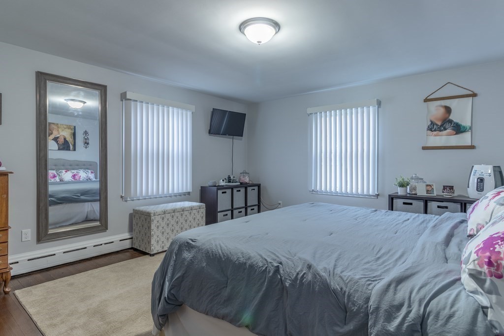 45 Baird Street Fall River, MA 02721 - Photo 27 of 42 a bedroom with a bed and a window