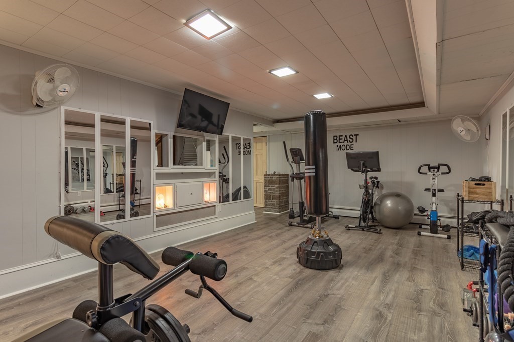 45 Baird Street Fall River, MA 02721 - Photo 35 of 42 a room with gym equipment and large mirror