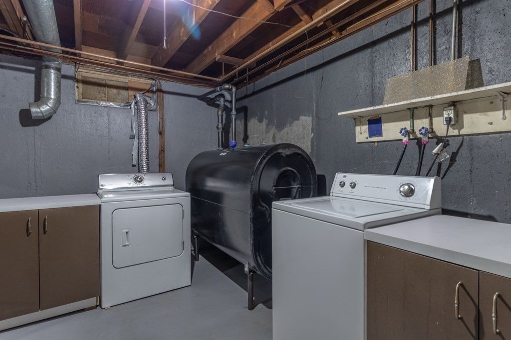 45 Baird Street Fall River, MA 02721 - Photo 41 of 42 a utility room with dryer and washer