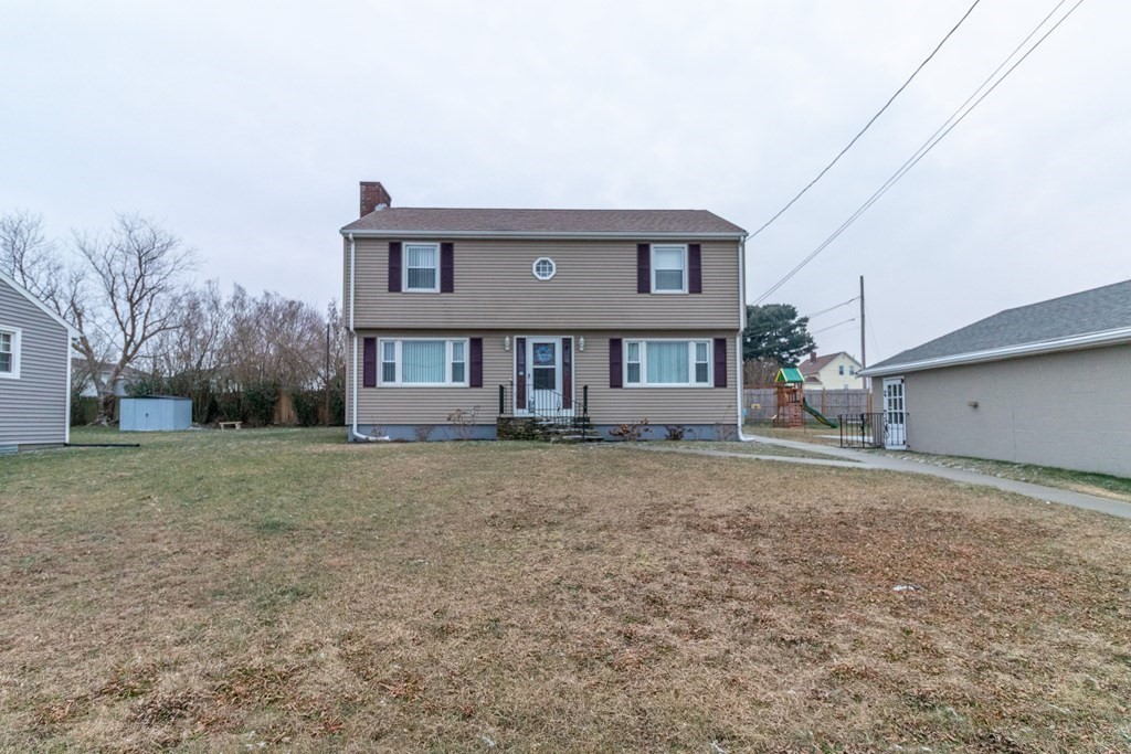 45 Baird Street Fall River, MA 02721 - Photo 5 of 42 a front view of a house with a yard