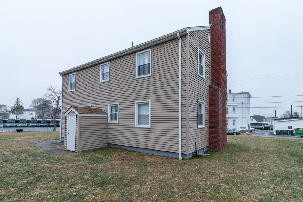 45 Baird Street Fall River, MA 02721 - Photo 7 of 42 a view of a house with backyard