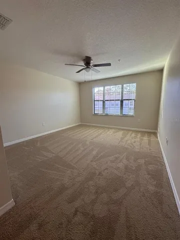 a bathroom with a double vanity sink and mirror