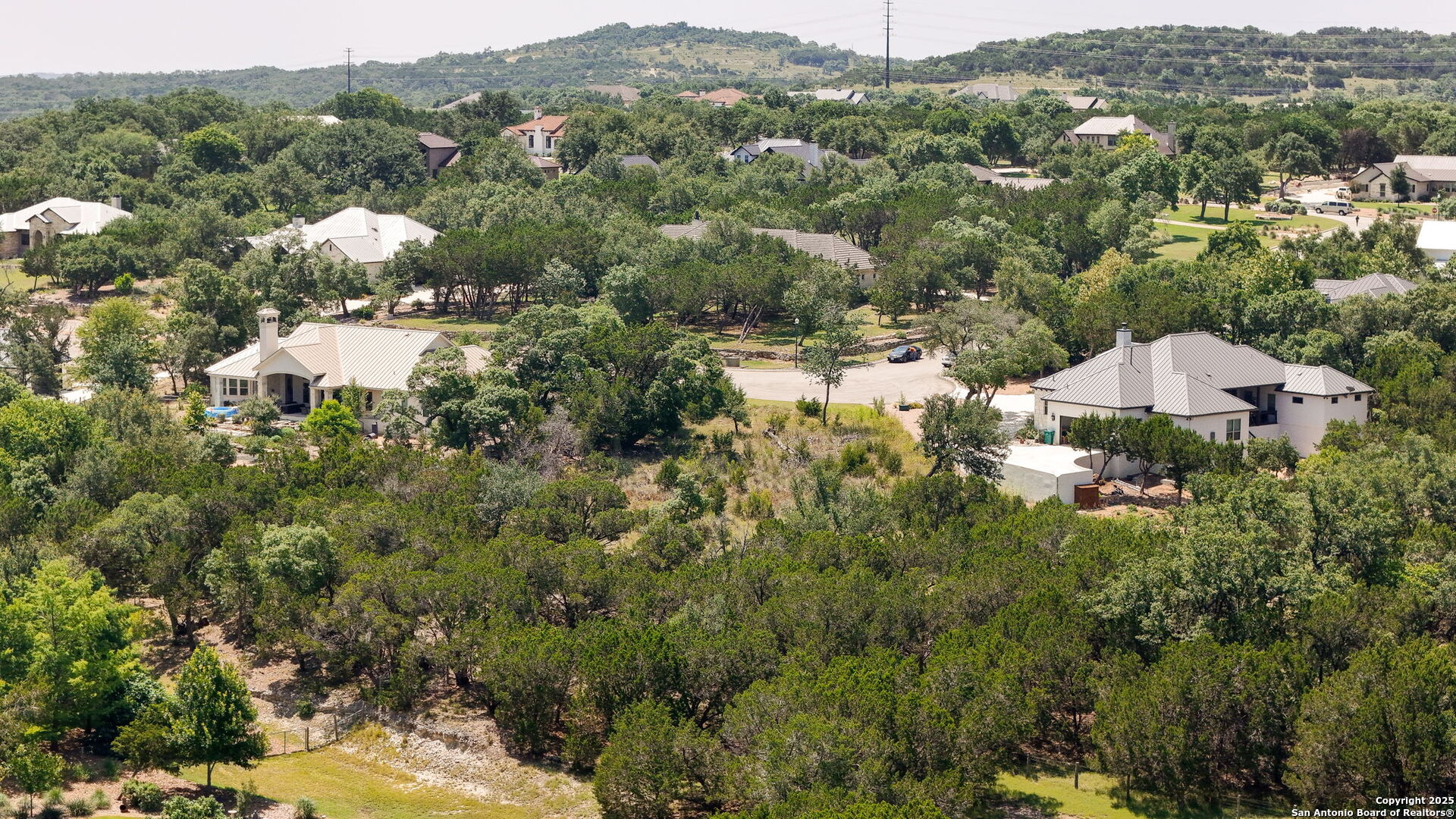 116 Balcones Bend Boerne, TX 78006 - Photo 13 of 25 a view of a house with a street lush green forest