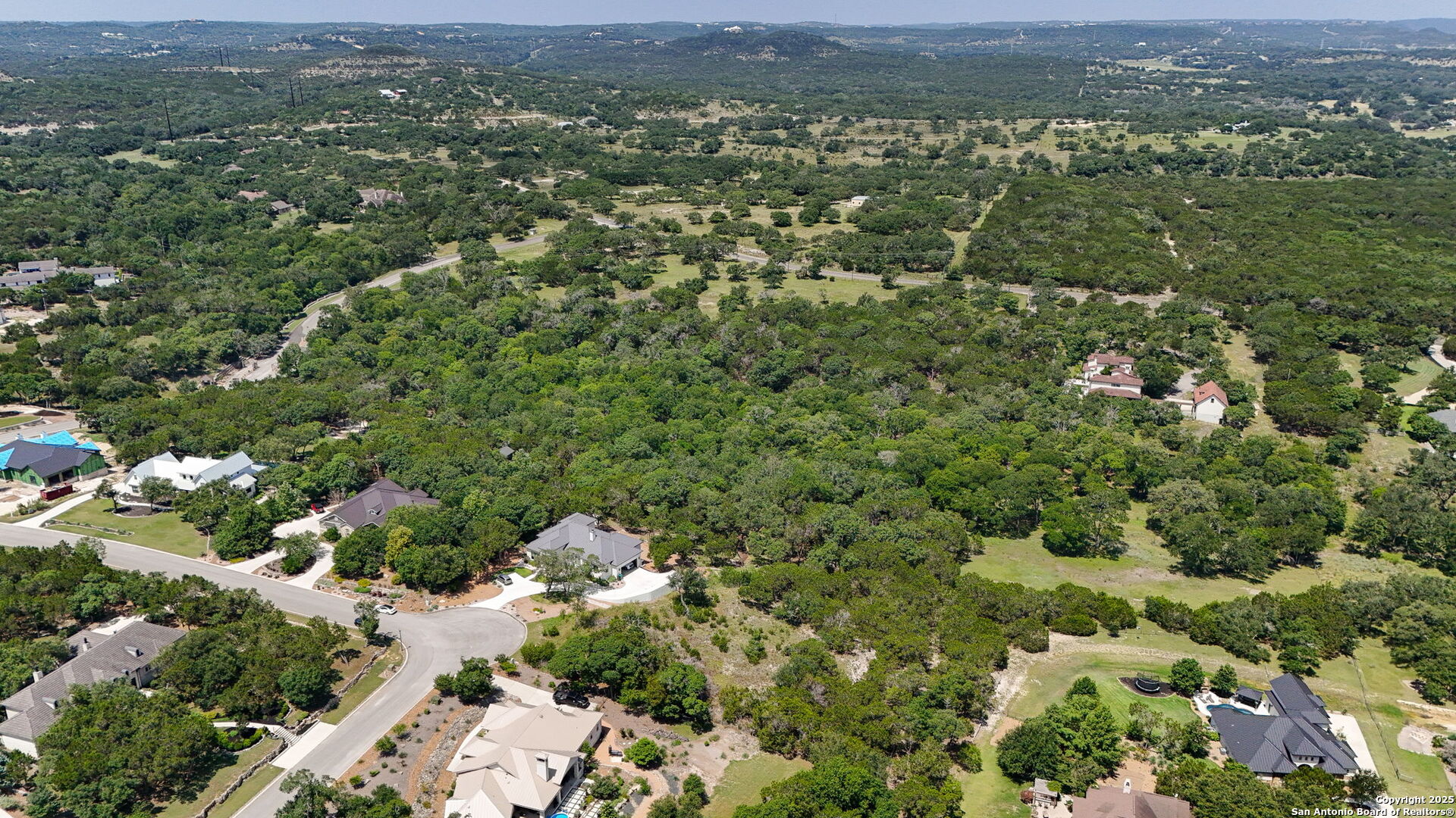 116 Balcones Bend Boerne, TX 78006 - Photo 16 of 25 an aerial view of residential houses with outdoor space and trees
