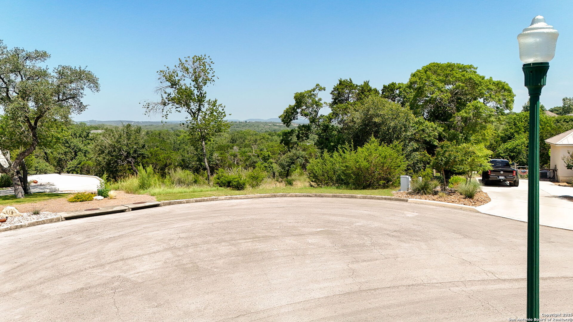 116 Balcones Bend Boerne, TX 78006 - Photo 2 of 25 a view of a roadside with trees