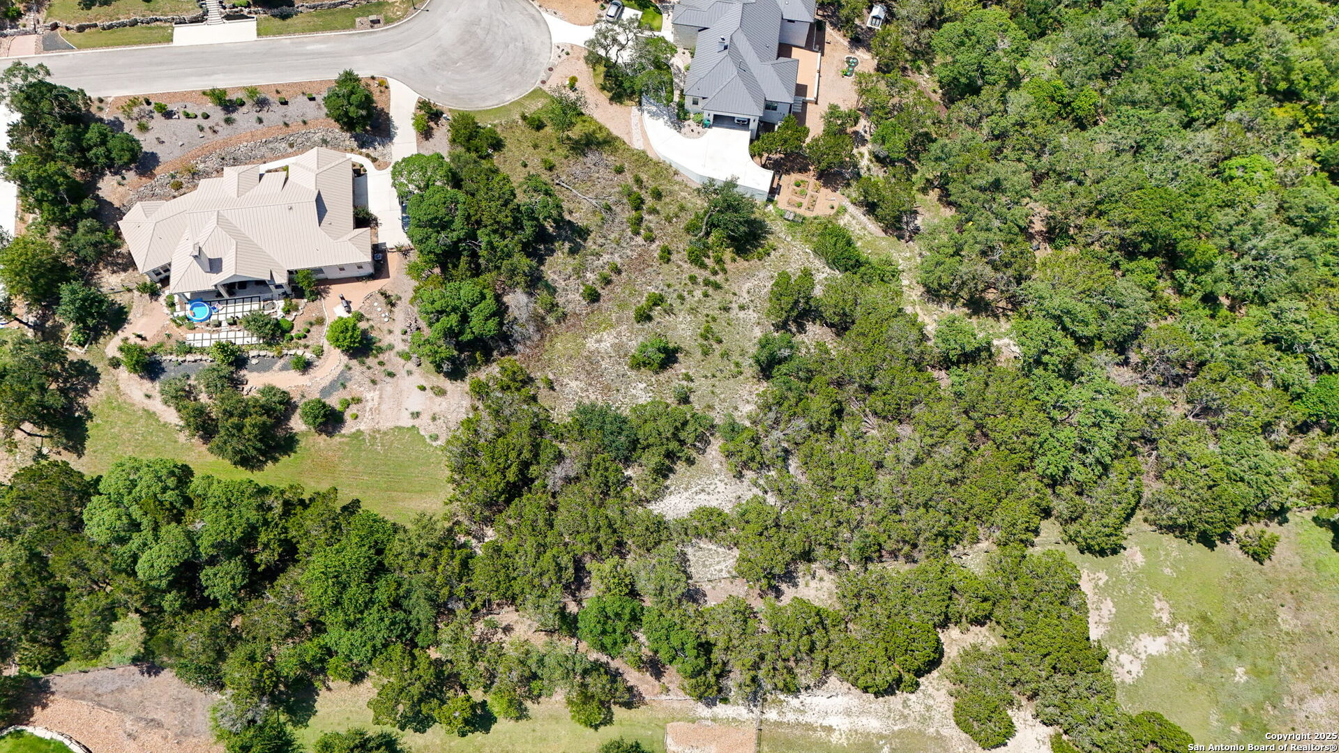 116 Balcones Bend Boerne, TX 78006 - Photo 6 of 25 an aerial view of residential house with parking space