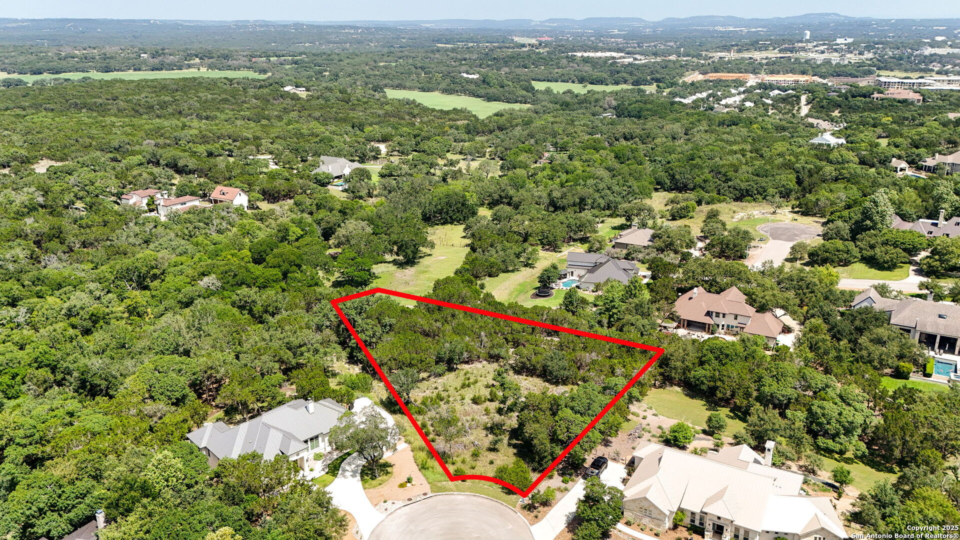 116 Balcones Bend Boerne, TX 78006 - Photo 9 of 25 an aerial view of residential houses with outdoor space and trees