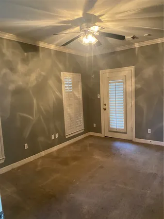 an empty room with windows