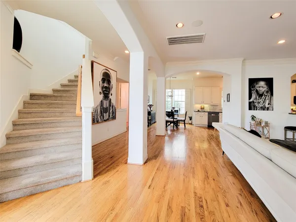 a view of a living room and hardwood floor