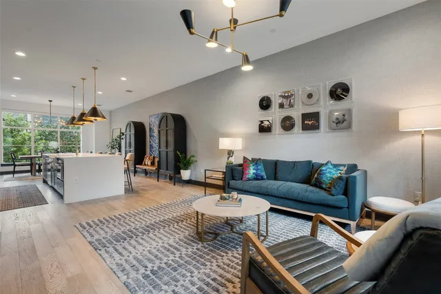 a open kitchen with stainless steel appliances granite countertop a refrigerator oven stove a sink and dishwasher