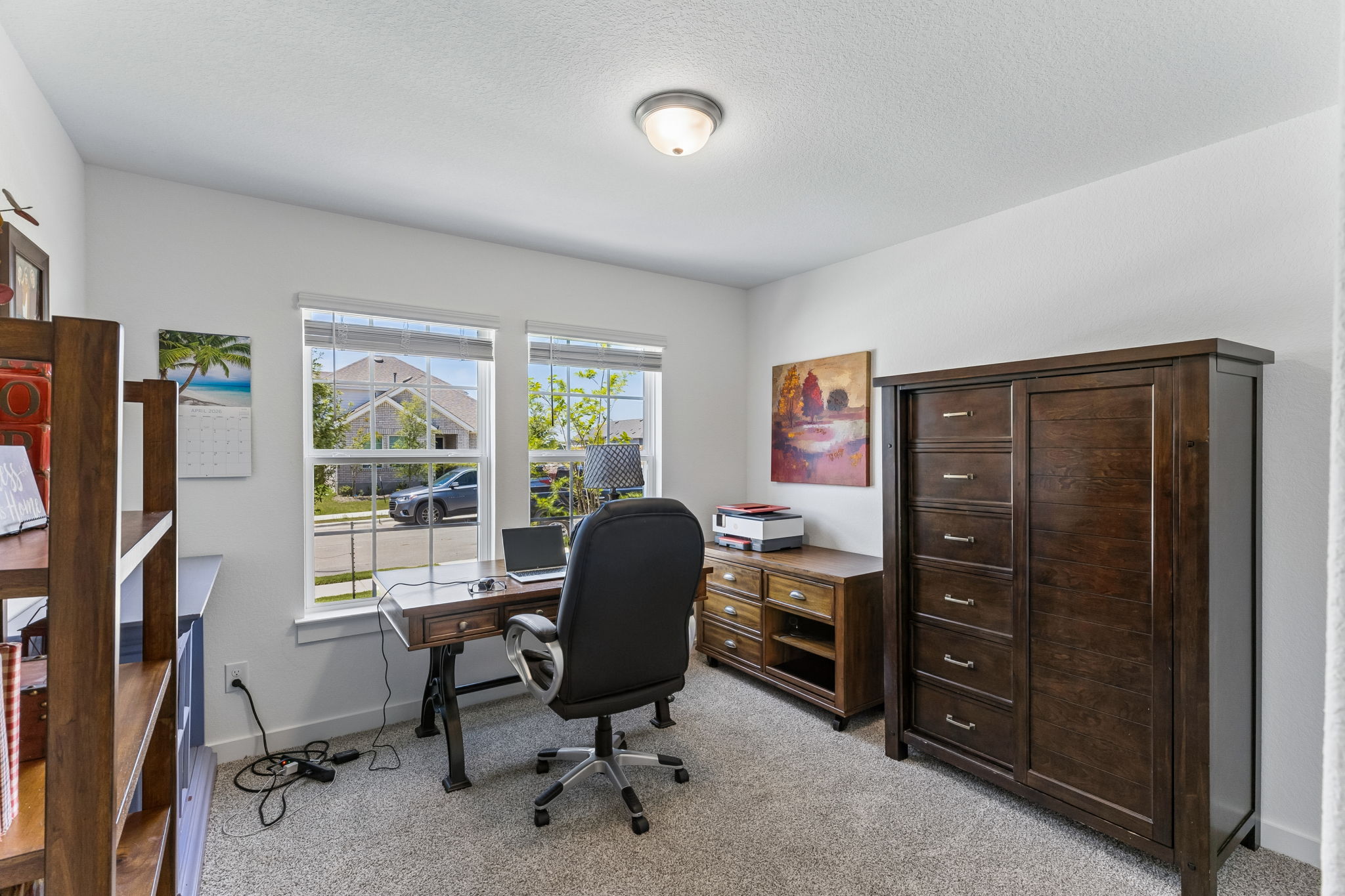 13509 Barn Chime Street Elgin, TX 78621 - Photo 14 of 40 Room is set up as office - located at front of home with great natural lighting.