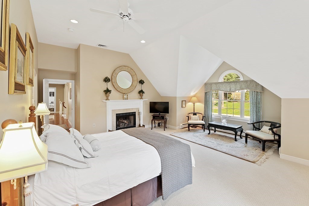 31 Draper Road Dover, MA 02030 - Photo 24 of 41 a living room with fireplace furniture and a large window