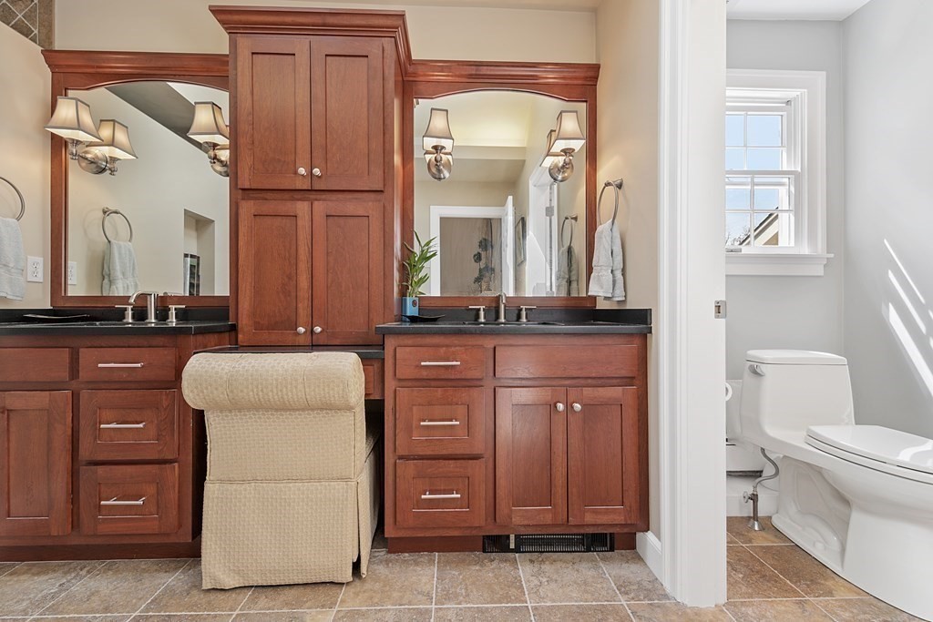 31 Draper Road Dover, MA 02030 - Photo 26 of 41 a bathroom with a granite countertop sink and a mirror