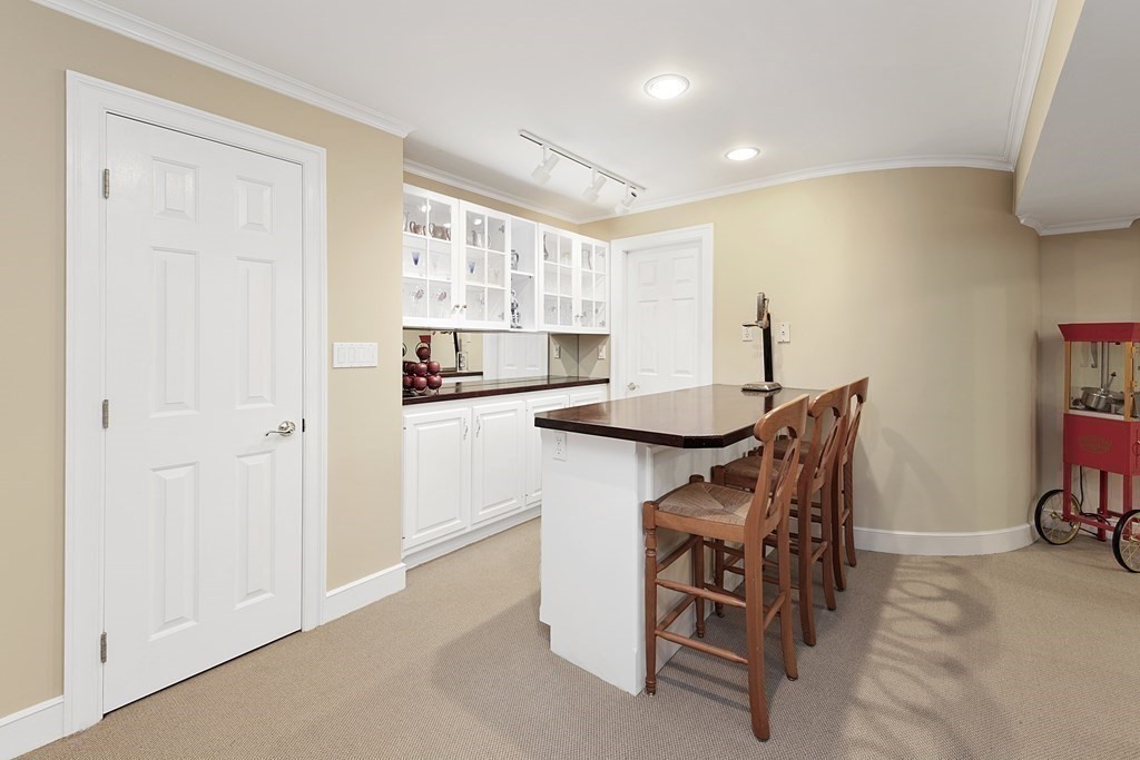 31 Draper Road Dover, MA 02030 - Photo 32 of 41 a view of a dining room with furniture and a window