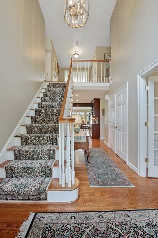 31 Draper Road Dover, MA 02030 - Photo 6 of 41 a view of entryway and hall with wooden floor