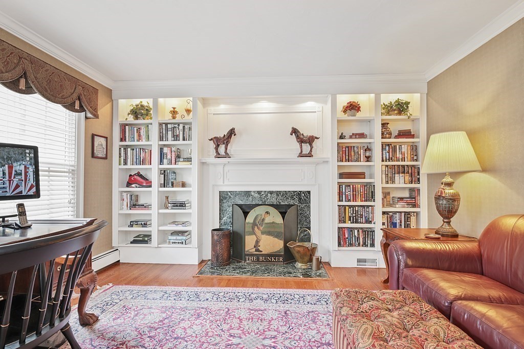 31 Draper Road Dover, MA 02030 - Photo 7 of 41 a living room with furniture and a fireplace