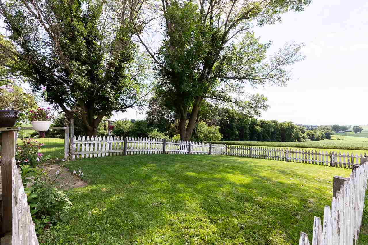 11218 Center Road Durand, IL 61024 - Photo 21 of 25 a view of a deck with a big yard and large trees