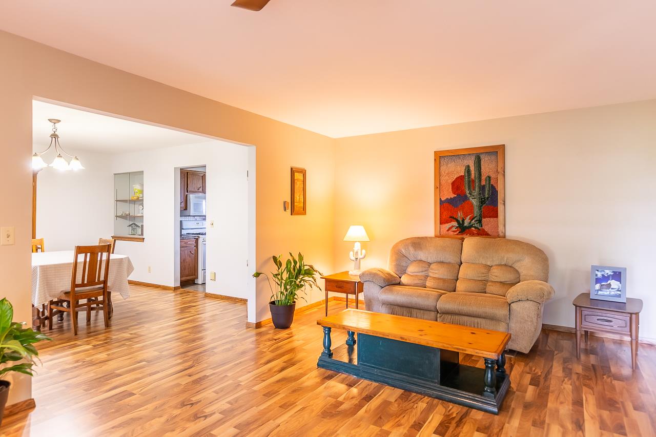 11218 Center Road Durand, IL 61024 - Photo 4 of 25 a living room with furniture and a wooden floor