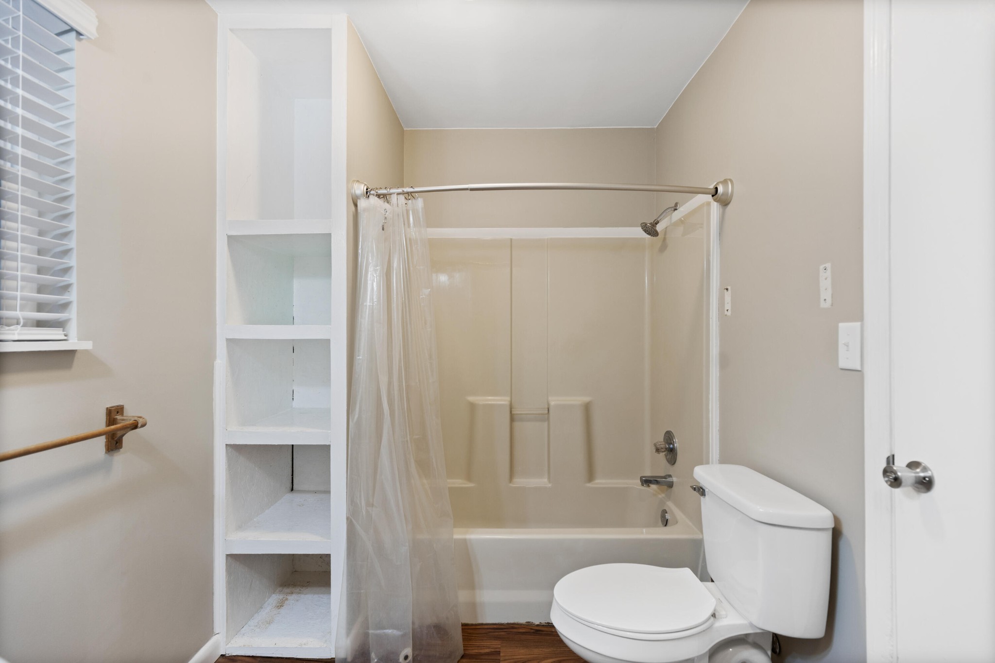 448 Apache Trail Northwest Cleveland, TN 37312 - Photo 15 of 38 a bathroom with a toilet and shower