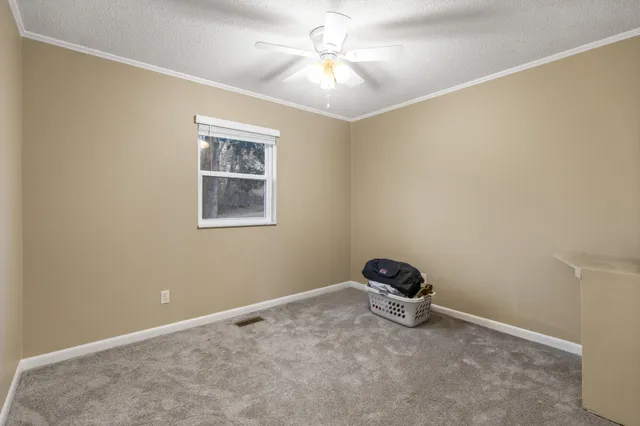 a room with cabinets and window
