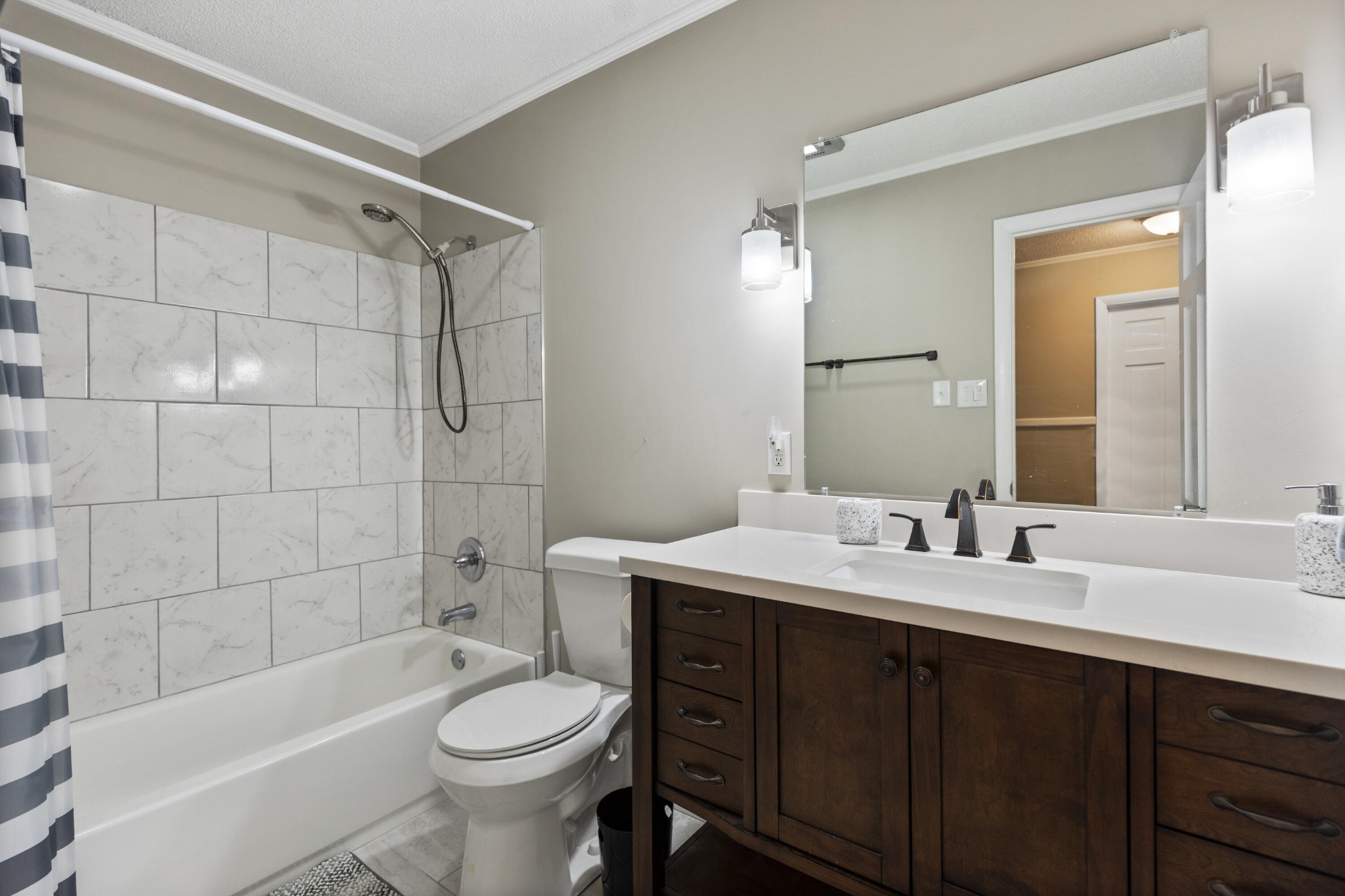 448 Apache Trail Northwest Cleveland, TN 37312 - Photo 20 of 38 a bathroom with a sink a toilet and shower